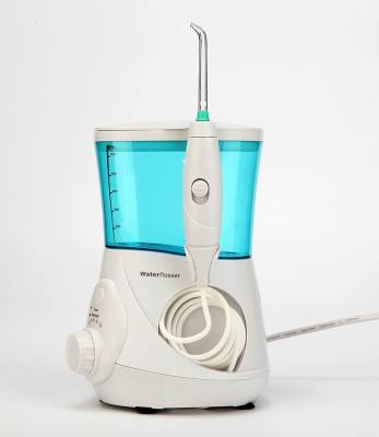 Dental spa oral irrigator with water pressure to 160psi and low noise